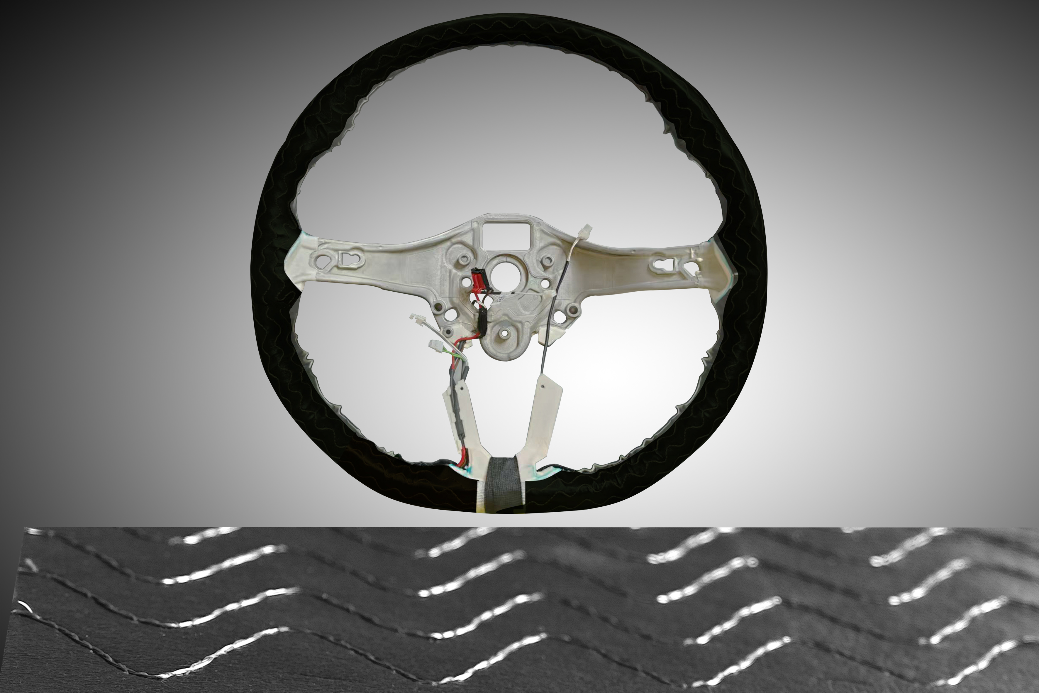 Steering wheel cushioning lining
