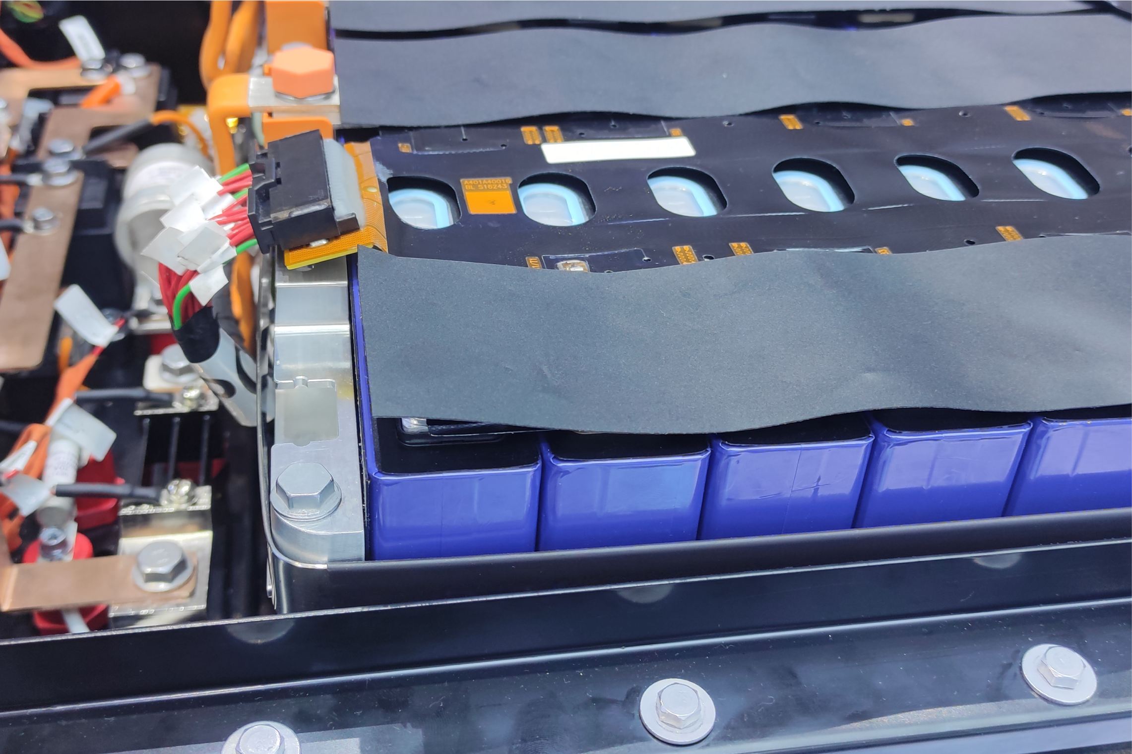 Battery module end plate cushion